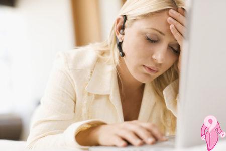 Tired woman in front of laptop computer