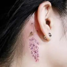 3d33997636de581b0c1c3226619095fe--ear-tattoos-flower-tattoos.webp