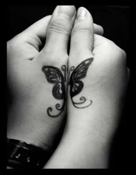 Black-Butterfly-Couple-Tattoos-On-Hands.webp