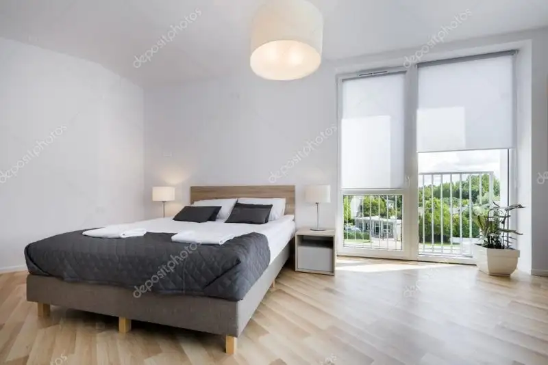 depositphotos_52566279-stock-photo-bright-and-comfortable-bedroom-interior.webp