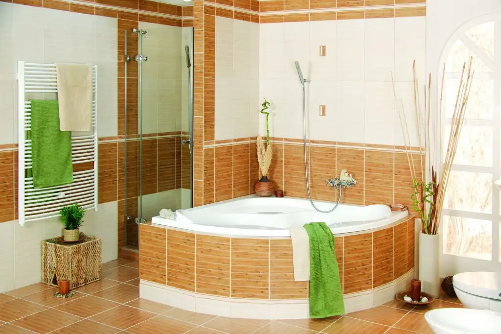 interior-design-style-bathroom-jacuzzi-shower-tiles-towels-flowers.webp