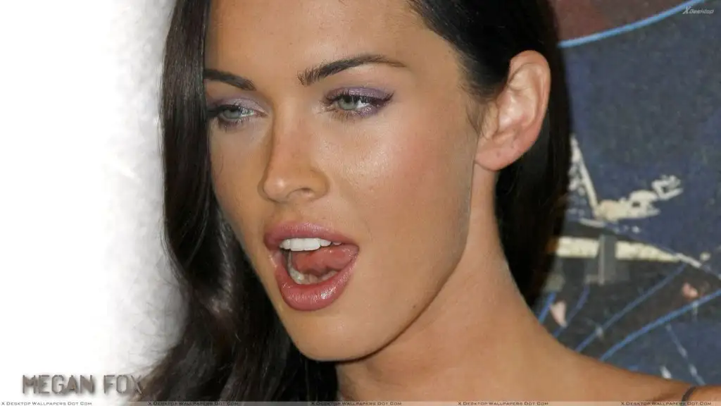 Megan Fox Shiny Eyes Make Up N Shiny Lips Face Closeup.webp