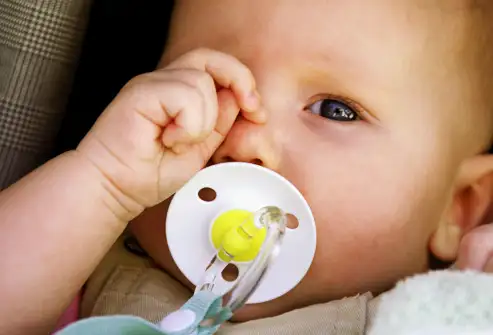 photolibrary_rm_photo_of_baby_rubbing_eye.webp