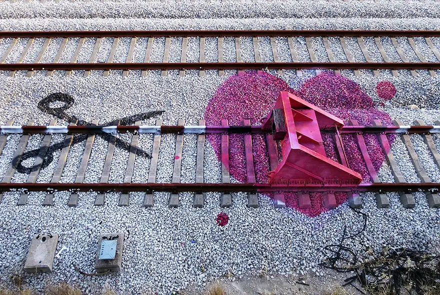 railway-train-tracks-portugal-street-art-artur-bordalo-3.webp