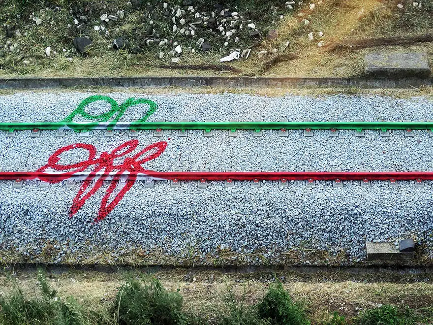 railway-train-tracks-portugal-street-art-artur-bordalo-5.webp