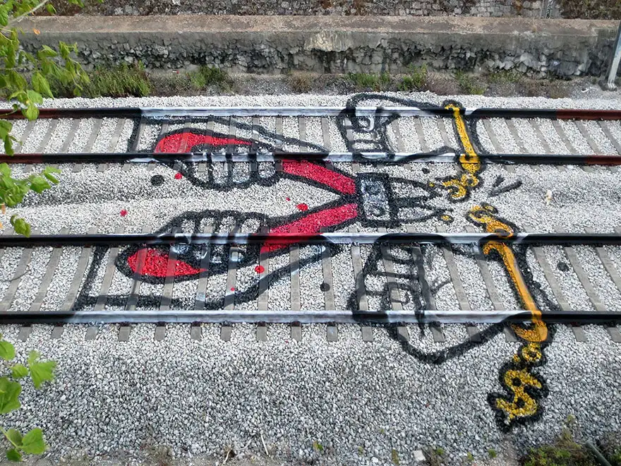 railway-train-tracks-portugal-street-art-artur-bordalo-7.webp