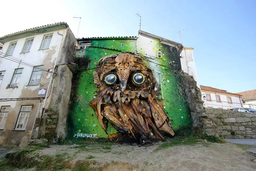 recycled-owl-sculpture-street-art-owl-eyes-artur-bordalo-1.webp