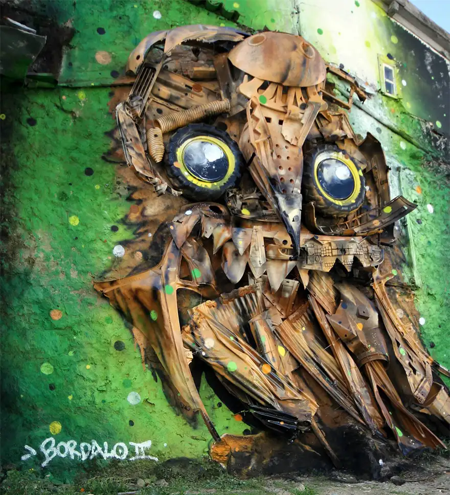 recycled-owl-sculpture-street-art-owl-eyes-artur-bordalo-2.webp