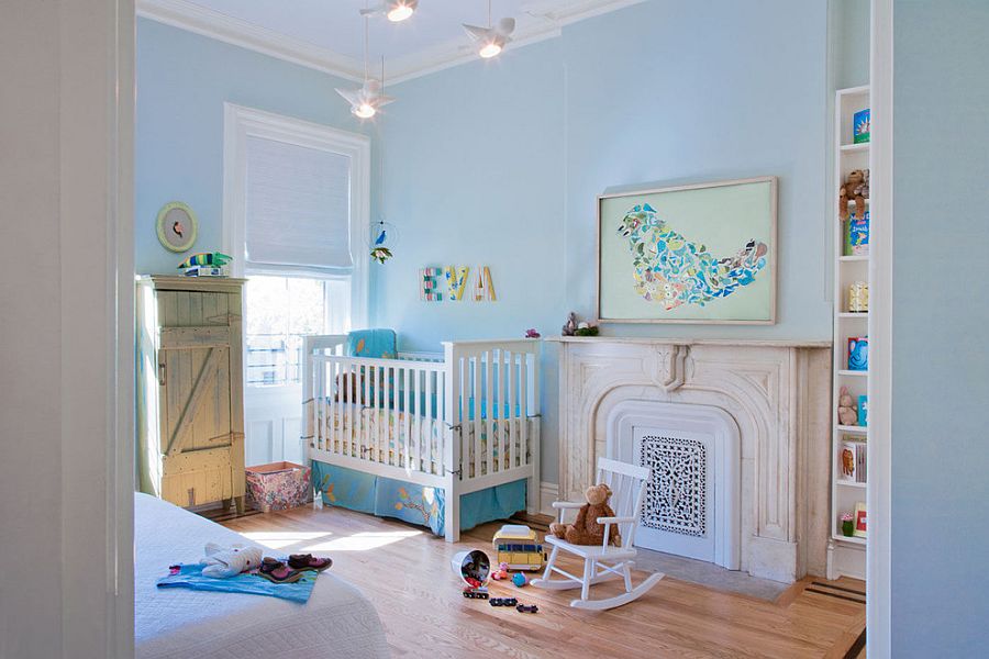 Soothing-nursery-in-light-blue-with-custom-wall-art.jpg