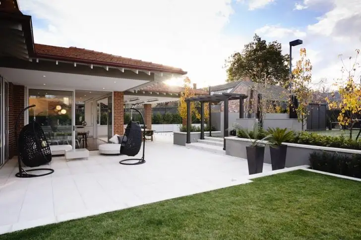 wonderful-contemporary-outdoor-with-brick-wall-and-black-daybeds-also-white-flooring-728x485.webp