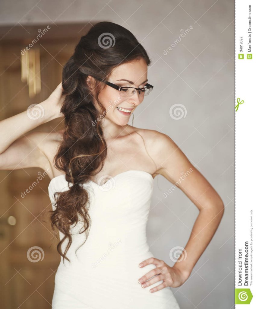 young-caucasian-bride-wearing-glasses-home-34918697.jpg