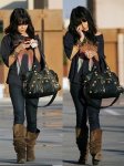 $vanessa_hudgens_out_and_about_Wildfox_Light_Feather_Raglan_tee_with_her_favorite_Part_Time_Balen.jpg