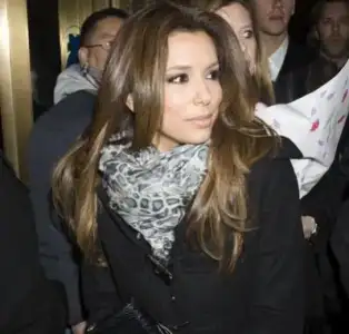 $eva longoria makeup race opening night december 2009.webp