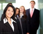 $2105299-business-team-with-a-businesswoman-leading-it--formed-by-young-hispanic-people-in-an-off.jpg