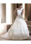 $organza-asymmetric-strap-with-flowers-decoration-rouched-skirt-in-chapel-train-2011-empire-desig.jpg