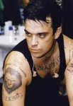 $robbie-williams-tattoos-8.jpg