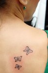 $kelebek_kadin_dovme_omuza_butterfly_tattoo.jpg