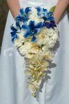 $cherie_blue_trumpet_lily_wedding_bouquet.jpg