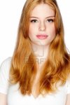 $4365864-a-beautiful-young-woman-with-auburn-hair-on-white-background.jpg