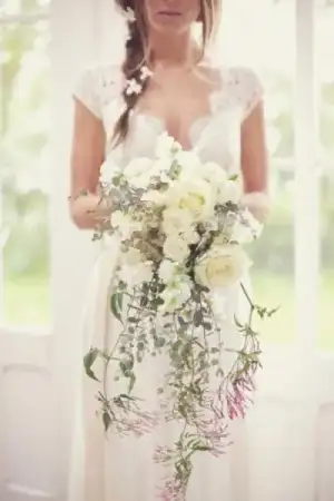 $wedding-trend-of-2014-30-charming-cascade-wedding-bouquets-22-500x750.webp