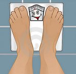 $persons-feet-weighing-scale-15359063.jpg