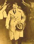 $Adolf_Hitler_walking_out_of_Brown_House_after_1930_elections.jpg