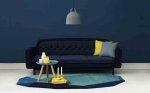 minimalist-blue-interior-design-ideas-navy-blue-wall-dark-blue-sofa-yellow-grey-cushions-915x571.jpg